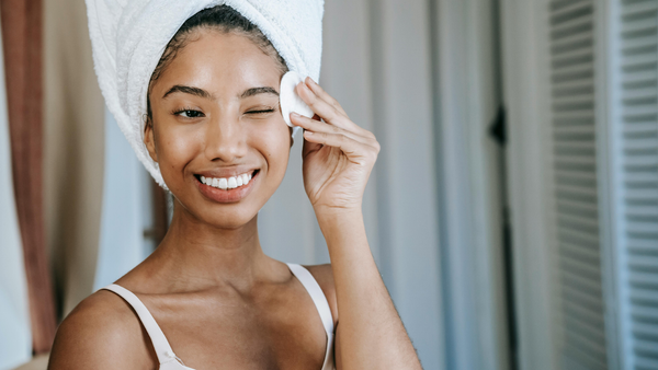 A Woman Using A Gentle Cleanser For Face